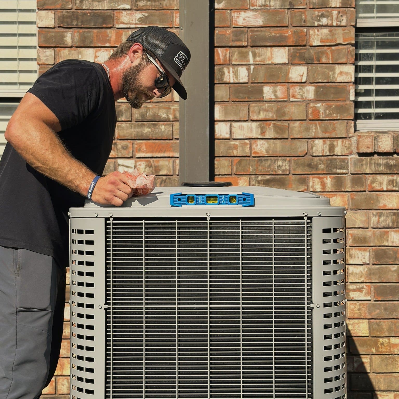 Flex tech inspecting ac unit